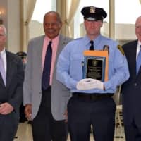 <p>William Berry, second from right, was named as Civilian Employee of the Year. With him are, from left, Deputy Police Commissioner Joseph F. Schaller, Dr. Leroy Mitchell, Police Foundation member; and Police Commissioner Patrick Carroll.</p>