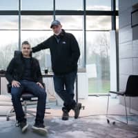 <p>Showrunners and Executive Producers of &quot;Billions,&quot; Greenwich resident David Levien (seated) and Brian Koppelman.</p>