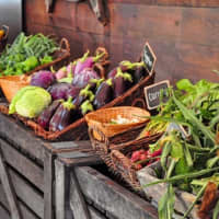 <p>Eggplant, corn and other veggies, grown by local organic farmers, are for sale at Blue Barn in Sloatsburg.</p>