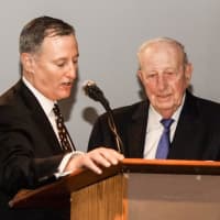 <p>Brian Kriftcher, left, founder of Stamford Peace, presents the Community Legacy Award to Herm Alswanger.</p>