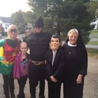 <p>Robin, Batman and others ready for the fun at Daily Voice community adviser Tricia Robbins&#x27; Halloween party Saturday.</p>
