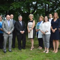 <p>First Selectman Steve Dunn and Selectwoman Sue Slater, center, lead the full slate of Democratic candidates for the fall election in Brookfield.</p>