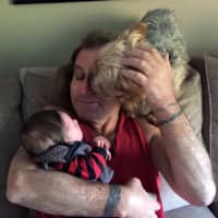 <p>Bruce Buffalino spending time with his great nephew, James, and Lucy the dog.</p>