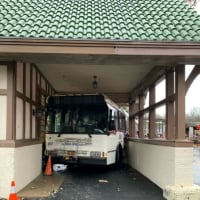 <p>A Westchester Bee-Line bus backed into an overhang at the Scarsdale MTA station.</p>