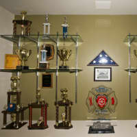 <p>Trophies that the Croton Falls Fire Department has won over the years are on display.</p>