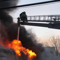 <p>Firefighters kept the blaze from spreading to an adjacent hardware store.</p>