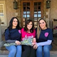 <p>Danielle and Sheri Carrier with mom, AnnMarie.</p>