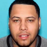 <p>Jayveon Caballero is at large and wanted for second-degree murder in the fatal shooting of former White Plains HS basketball star Markus Austin, police said..</p>
