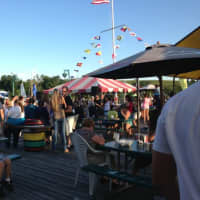 <p>Captain&#x27;s Cove Seaport in Bridgeport offers family friendly outdoor dining on its spacious deck.</p>
