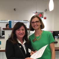 <p>DCA Thrift Shop Manager Carol Smith and Darien Chamber of Commerce Executive Director Susan Cator. The 2016 Non-Profit of Darien Award goes to the DCA Thrift Shop.</p>