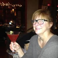 <p>Cathryn Fadde, owner of Cathryn&#x27;s Tuscan Grill in Cold Spring, enjoys one of the restaurant&#x27;s signature holiday drinks.</p>