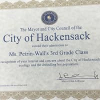 <p>The mayor presented a certificate of admiration to Ms. Petrin-Wall&#x27;s third grade class</p>
