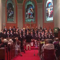 <p>The Chapel School Choir sings for members of the Wartburg Adult Care Community.</p>