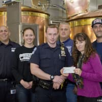 <p>Winners of Chili Cookoff presented with check</p>