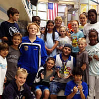 <p>Pound Ridge swimmers will honor late coach Christopher Dewey, center, with a swim-a-thon on July 9.</p>