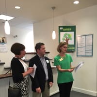 <p>Cindy Palmer and Greg Palmer receiving their 2016 Green Choice Award from Susan Cator</p>