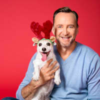 <p>TV star Clinton Kelly with his dog, Mary, adopted from Harrison&#x27;s Pet Rescue. Kelly is matching donations to the non-profit animal shelter and made up pets for a magazine spread.</p>