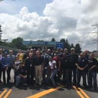 <p>The riders pose during a stop on their tour to honor other officers.</p>