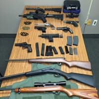<p>Guns and ammo seized by Northvale police.</p>
