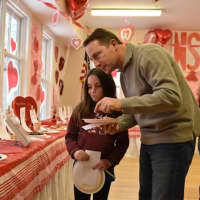<p>Westchester County Executive Rob Astorino and his daughter, Ashlin, check out the entries inn the Valentine&#x27;s cookie bake-off at the North Salem Volunteer Ambulance Corps Sunday.</p>