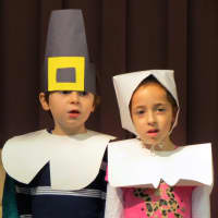 <p>Meadow Pond Elementary School students sang songs and recited historical facts about Thanksgiving at the fest.</p>