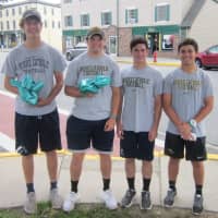 <p>Left to right: Burke Catholic Football players and volunteers Cory Lee, Danny Gandt, James Shaw, and Kurt Grimm.</p>