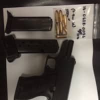 <p>The handgun and ammunition police seized after arresting a city man Tuesday.</p>