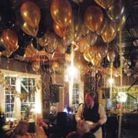 <p>Gold balloons lend a festive air to New Year&#x27;s celebrations at Crabtree&#x27;s Kittle House in Chappaqua.</p>