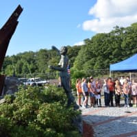 <p>Pierre Van Cortlandt Middle School fifth-grade students performed “Together We Can Change the World” at the Croton-on-Hudson/Buchanan/Cortlandt 9/11 Memorial Service at Croton Landing Park on Friday.</p>