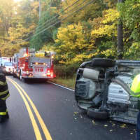 <p>Emergency fire and medical crews at the scene of a one-car crash on West Mount Airy Road in Croton-on-Hudson Tuesday morning.</p>