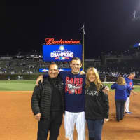<p>Anthony Rizzo with his parents after the Cubs clinched the National League championship.</p>