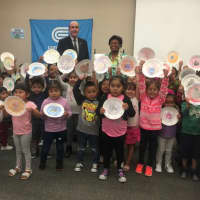 <p>Westchester Deputy County Executive Kevin Plunkett has fun with Reading Buddies.</p>