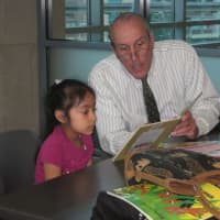 <p>Westchester Deputy County Executive Kevin Plunkett takes part in the Reading Buddies program.</p>