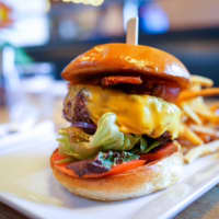 <p>The burger at Gates Restaurant in New Canaan gets rave reviews.</p>