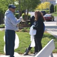 <p>Commissioner of Parks and Public Property Thomas DiMaggio chats with a volunteer.</p>