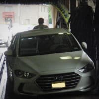 <p>Business remained temporarily closed while the sedan was removed.</p>