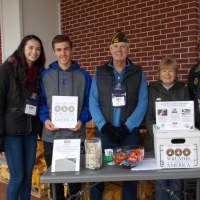 <p>Darien High School Support Our Soldiers members Catriona Mcintyre and Keenan Warble with VFW Post #6933 Quartermaster, John Driscoll and wife Joanne; and VFW Chaplain, Dennis Clayburn.</p>