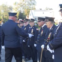 <p>Emerson firemen in their dress blues for the 9/11 memorial.</p>