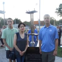 <p>The 9/11 memorial unveiled on the 14th anniversary of the attacks honored Gary Albero, who died in the World Trade Center. Pictured are his son, Michael, wife Aracelis and brother Andy.</p>