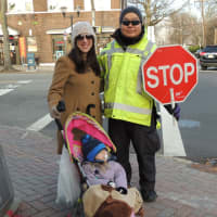 <p>Charlie Lee and Jamie Sclafane at the corner of Fort Lee Road and Broad Avenue, where a car ignored the stop sign when she was crossing with her toddler.</p>