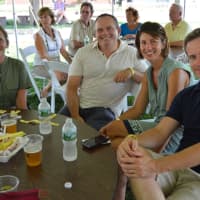 <p>Friends gather together for good beer, food and company to serve a good cause.</p>