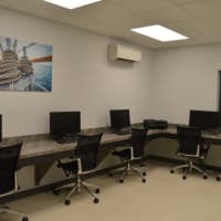 <p>Residents at Crescent Crossings may use this business room outfitted with computers.</p>