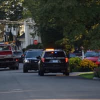 <p>A police pursuit ends Sunday in a Southport neighborhood.</p>
