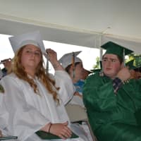 <p>Newly minted Webutuck High School graduates turn their tassels at the 2016 commencement.</p>