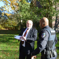 <p>New Castle Police confront Will Wedge as he is giving a press conference in front of the Chappaqua school district&#x27;s administrative building. Police responded on the district&#x27;s behalf.</p>
