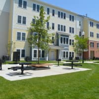 <p>Crescent Crossings courtyards feature benches and BBQ grills.</p>