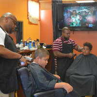 <p>Kids lined up for free haircuts just in time for the start of school at North East Barbershop in Bridgeport.</p>