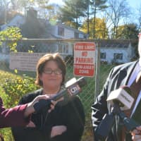 <p>Will Wedge, right, resumes his press conference on a nearby sidewalk after New Castle Police directed him to leave the grounds of the Chappaqua school district&#x27;s administrative building. Fellow parent Sandy Nohavicka is pictured at left.</p>