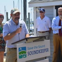 <p>New Long Island Soundkeeper Bill Lucey addresses the crowd as U.S. Rep. Rosa DeLauro, left, looks on.</p>