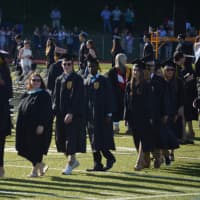 <p>Filing in for the Trumbull High graduation</p>